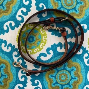 Dooney & Bourke crossbody leather strap.